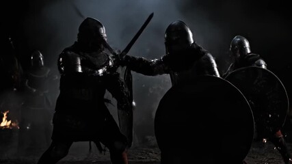 Medieval Knights Brutal Hand-to-Hand Combat - Two armored knights clash in a fierce, hand-to-hand battle, their swords colliding with sparks flying in the dark. - Powered by Adobe