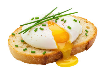 Isolated poached egg dripping on a piece of toast with chives, a tasty culinary breakfast