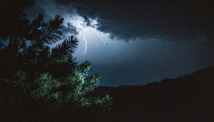 A spectacular bolt of fork lightning illuminates the dark, cloudy sky during a dramatic thunderstorm over a silhouetted pine forest at night