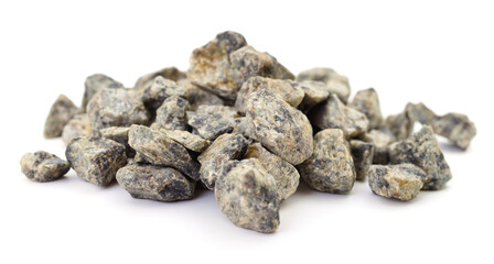 Pile of crushed gray stones isolated on white background