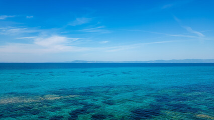 Vacation View: Sandy Coastline and Crystal-Clear Sea in Greece