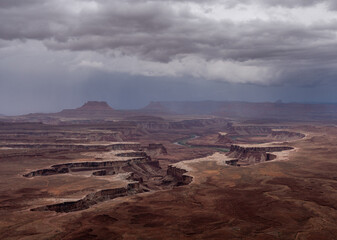Dead horse point national park during rainy day with dramatic thunder clouds