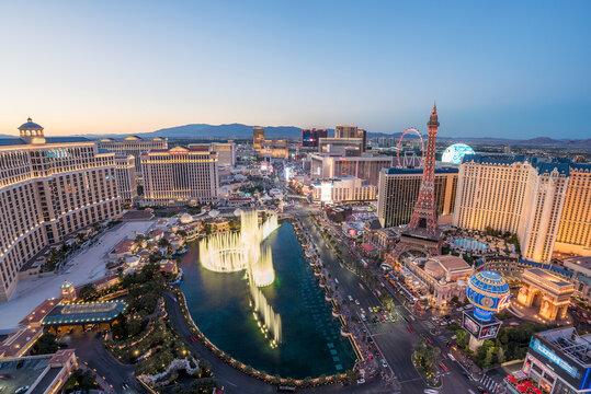 Las Vegas, Nevada, USA - 8th of may 2025: Blue hour image of the Las Vegas strip with illuminated neon lights and fountain show