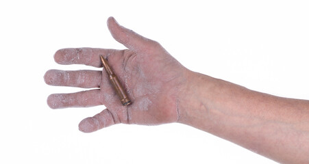 hand with a bullet isolated on a white background