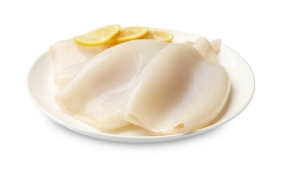 Pieces of raw squids with lemon isolated on white