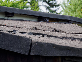Damaged roof strip insulation due to heat.

