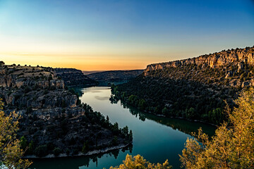Sunset landscape in the ecosystem of the Duraton River gorges, in Segovia, Spain.