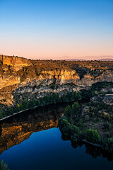 Sunset landscape in the ecosystem of the Duraton River gorges, in Segovia, Spain.