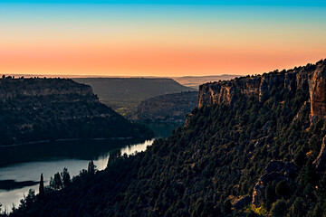 Sunset landscape in the ecosystem of the Duraton River gorges, in Segovia, Spain.