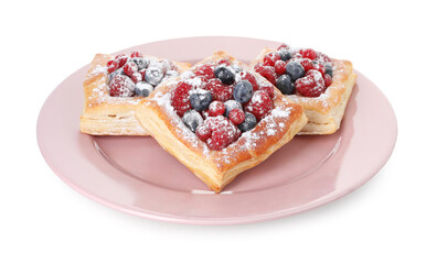 Tasty puff pastries with berries and powdered sugar isolated on white