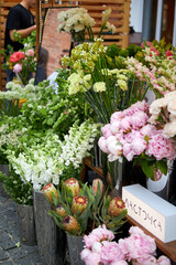Stalls with flowers and bouquets at local street market