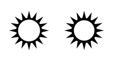 Two abstract black shapes featuring circular forms with pointed edges