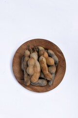 Tamarindus indica white background, Tamarindus indica food flavoring and traditional herbal medicine ingredients