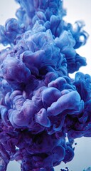 Indigo ink clouds swirling in water