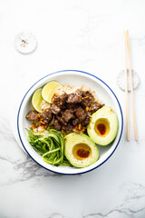Rice with beef and avocado