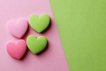 Pink and green hearts on a pastel background (1)