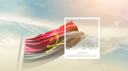 Angola flag waving proudly under a bright sky with text happy independence day. Angola national...