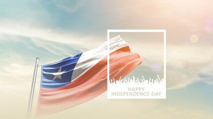 Chile flag waving proudly under a bright sky with text happy independence day. Chile national flag...