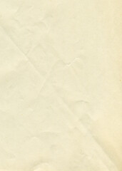 Vintage paper texture. Old antique sheet paper texture. Aged wrinkled paper background.	