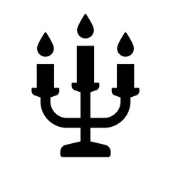 An illustration depicting a black icon of Halloween scary holiday attributes on a white background