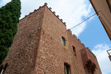 View of a medieval tower with gothic architecture.
