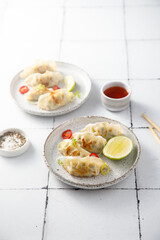 Fried dumplings with chili sauce