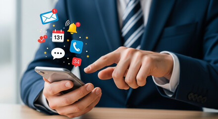 Businessman checking smartphone with various app notifications and icons mobile phone