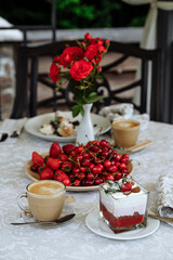 Elegant Breakfast Table with Fresh Berries and Coffee