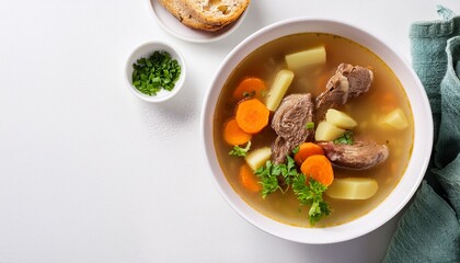 traditional icelandic lamb soup in the white bowl standing on the white table flat lay copy space