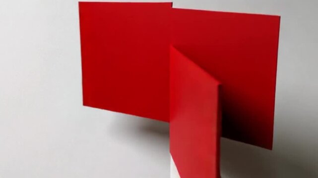 Red and white paper arrows emerge from an open box, a 3D illustration symbolizing business design