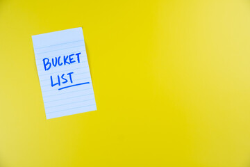 blank Bucket list note on yellow background, travel goals and destinations 2026 concept 