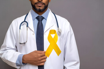 Doctor in white coat holding yellow ribbon, isolated stock photo with transparent background for health awareness campaigns
