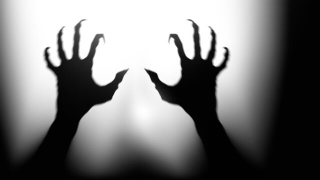 Shadow overlay effect for halloween background with Terrifying scary hands with long nails,Creepy monster claw,silhouette of hands,zombie hand rising out of a graveyard