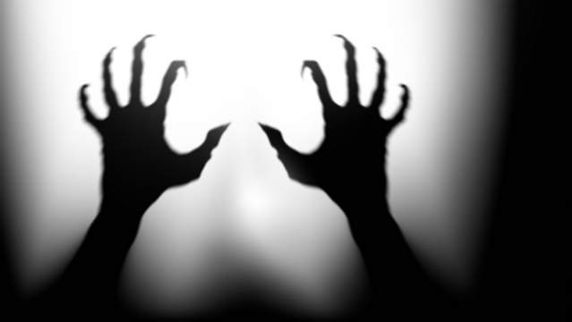 Shadow overlay effect for halloween background with Terrifying scary hands with long nails,Creepy monster claw,silhouette of hands,zombie hand rising out of a graveyard
