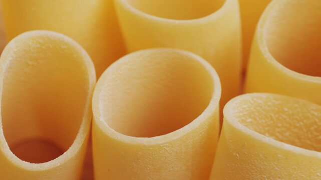 Italian pasta Paccheri, Cannelloni type of pasta in the shape of a very large tube, originating from Campania