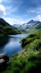 Scenic Mountain Lake with Snow-Capped Peaks and Green Valleys