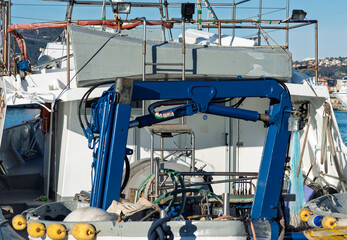 Fishing boats and nets. Fishing boats and equipment such as nets in the Italian port of La Spezia.