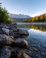 Serene Mountain Lake with Rocky Shore and Forests