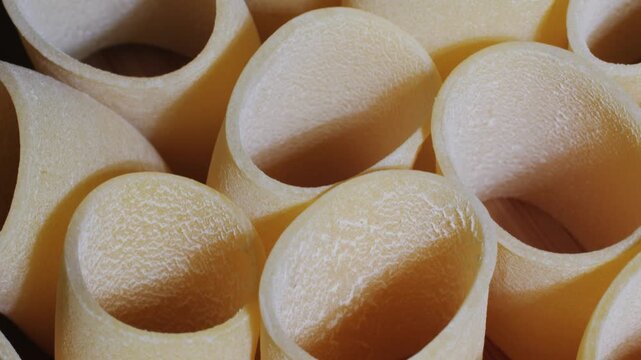 Italian pasta Paccheri, Cannelloni type of pasta in the shape of a very large tube, originating from Campania