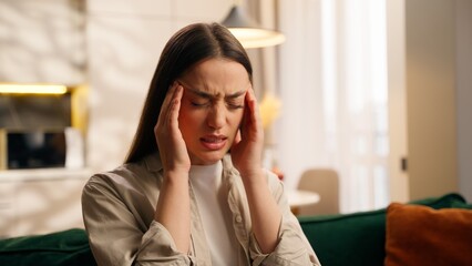 Portrait upset sad Caucasian woman girl female lady feeling headache pain ache bad symptoms head...