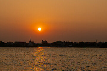 View of the sunset along Chao Phraya river at Samut Prakan, Thailand