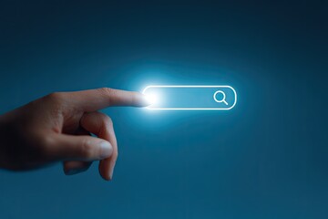 Hand touching a glowing search bar on a blue background.