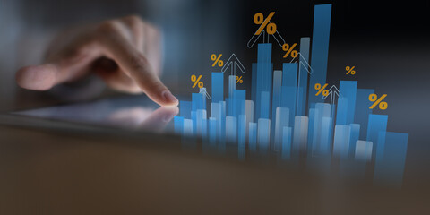 Financial Growth and Rising Interest Rates Visualization on Digital Tablet.