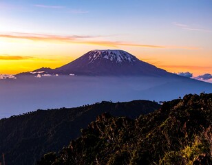 Majestic mountain peak at sunrise