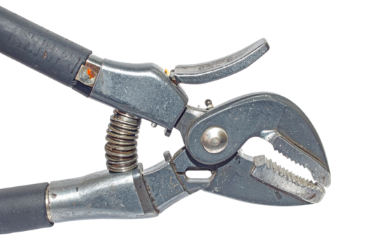 a pipe wrench on a transparent surface