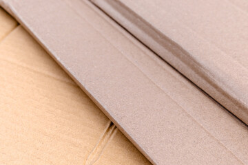 corrugated cardboard texture, brown carton paper for packaging industry, recycling, logistics, export import, and warehouse use, corrugated cardboard for background, paper waste recycling concept