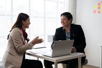 Business people having a conversation in the office