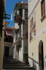Charming Alley with Murals and Balconies in Calabria, Italy