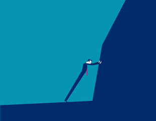 Businessman trying to move mountains