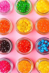 Colorful gummy candies on pink background. Sweet and playful dessert scene.